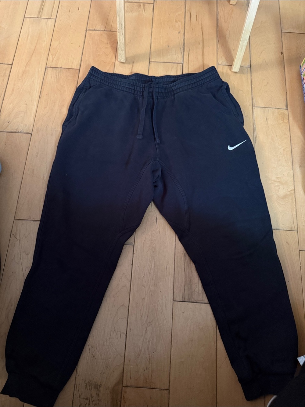 Nike Men’s Black Jogger Sweatpants with White Swoosh Accent